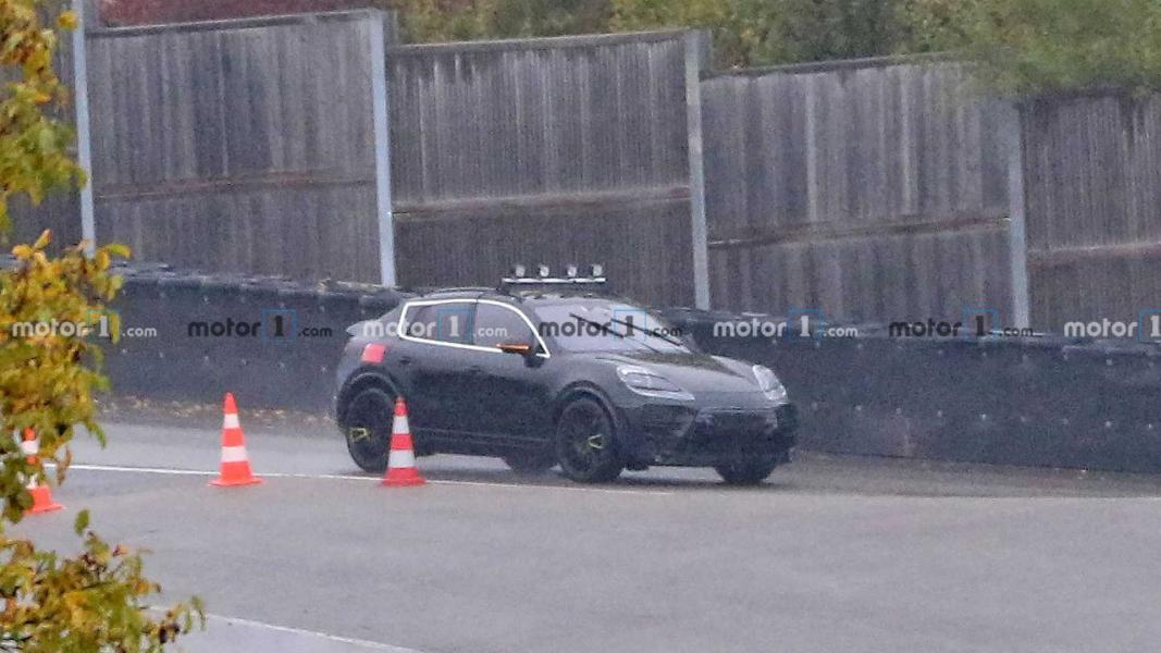 2022-porsche-macan-electric-first-spy-photo-front-three-quarters-1