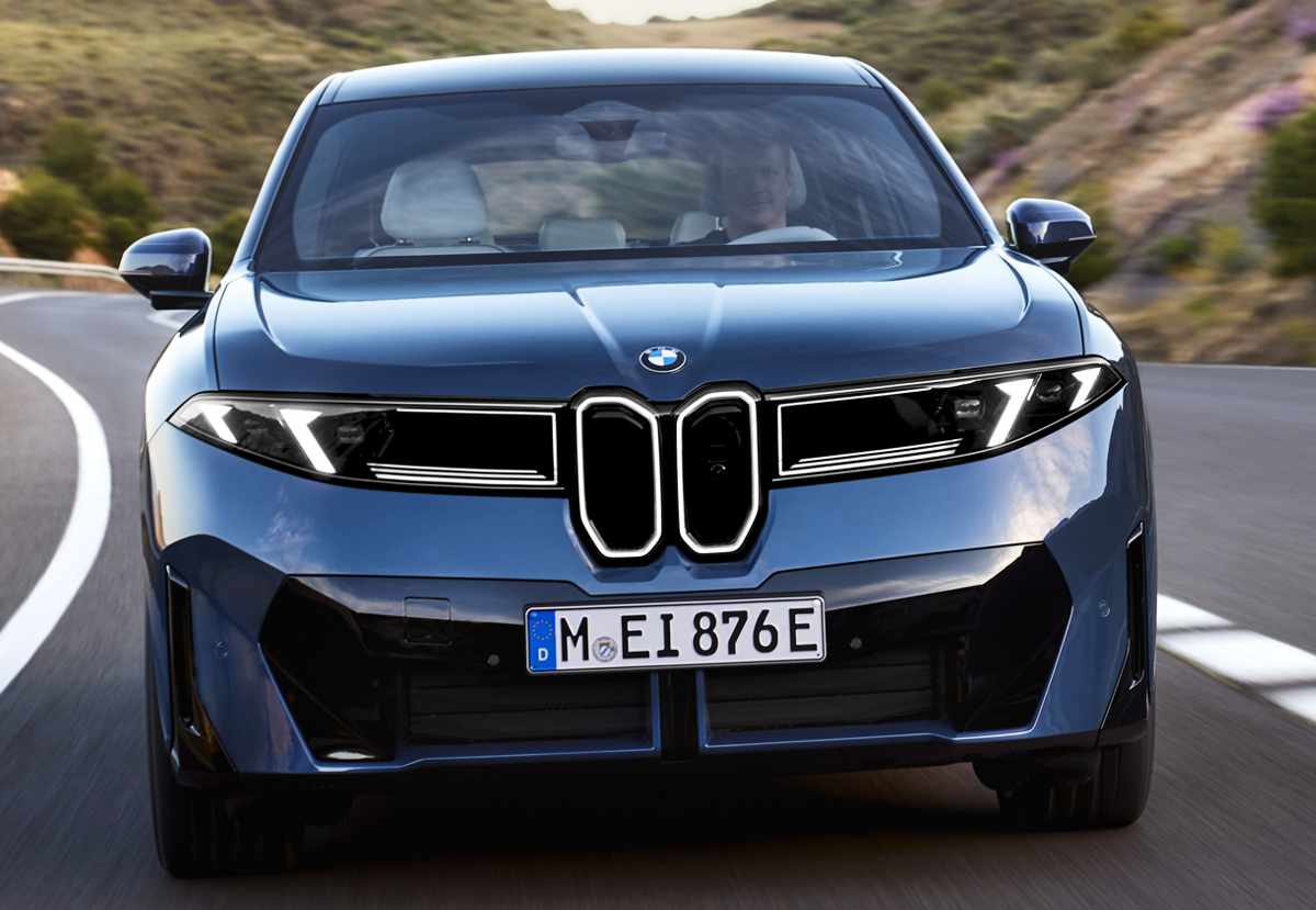 Acercamiento detallado al frontal de la nueva BMW iX3 azul, exhibiendo la tecnología de su parrilla Iconic Glow y las luces diurnas LED con trazos diagonales.