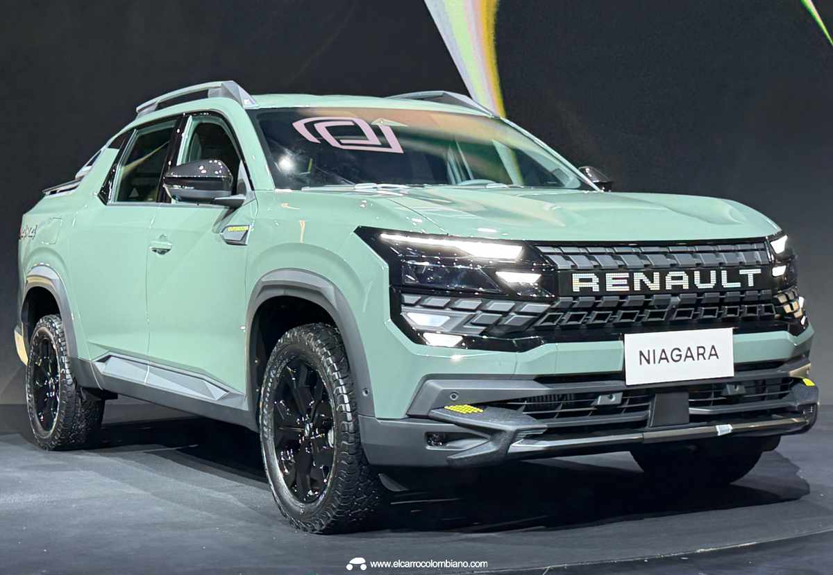 Plano frontal de tres cuartos de la pick-up Renault Niagara color verde claro en su presentación oficial, destacando su persiana iluminada con efecto píxel y líneas robustas.